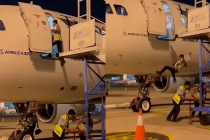 Vidéo : Un travailleur chute de plusieurs mètres d'un avion après que...
